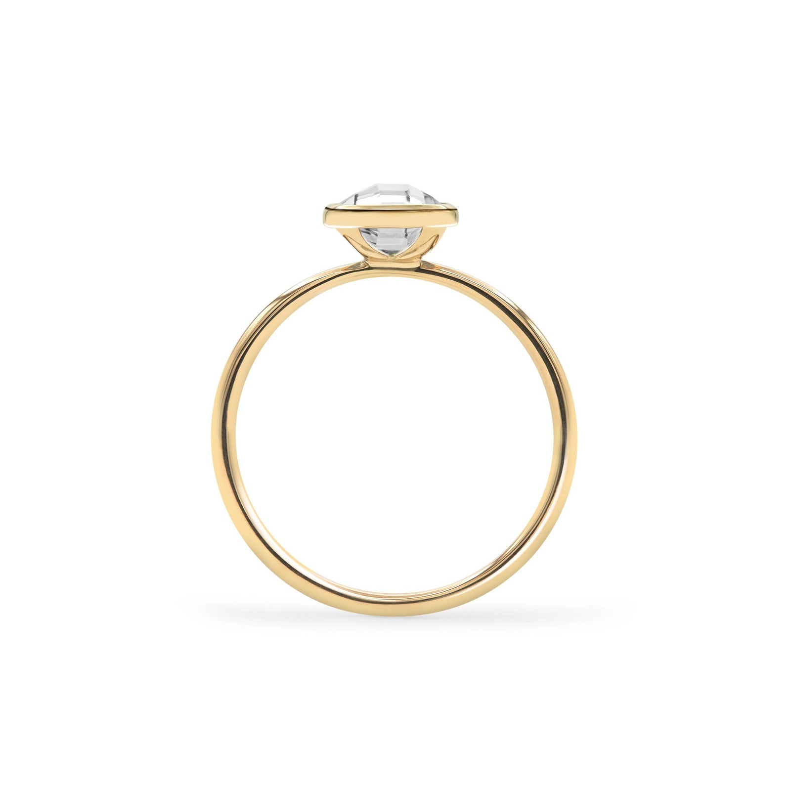 1.6 mm wide 14k yellow gold Grand ring featuring one 6 mm briolette cut bezel set white topaz - standing view
