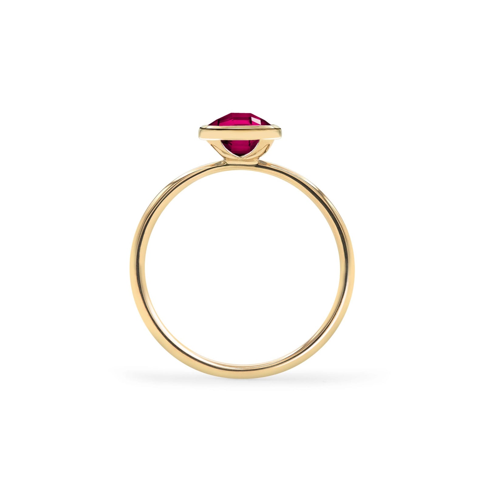 1.6 mm wide 14k yellow gold Grand ring featuring one 6 mm briolette cut bezel set ruby - standing view
