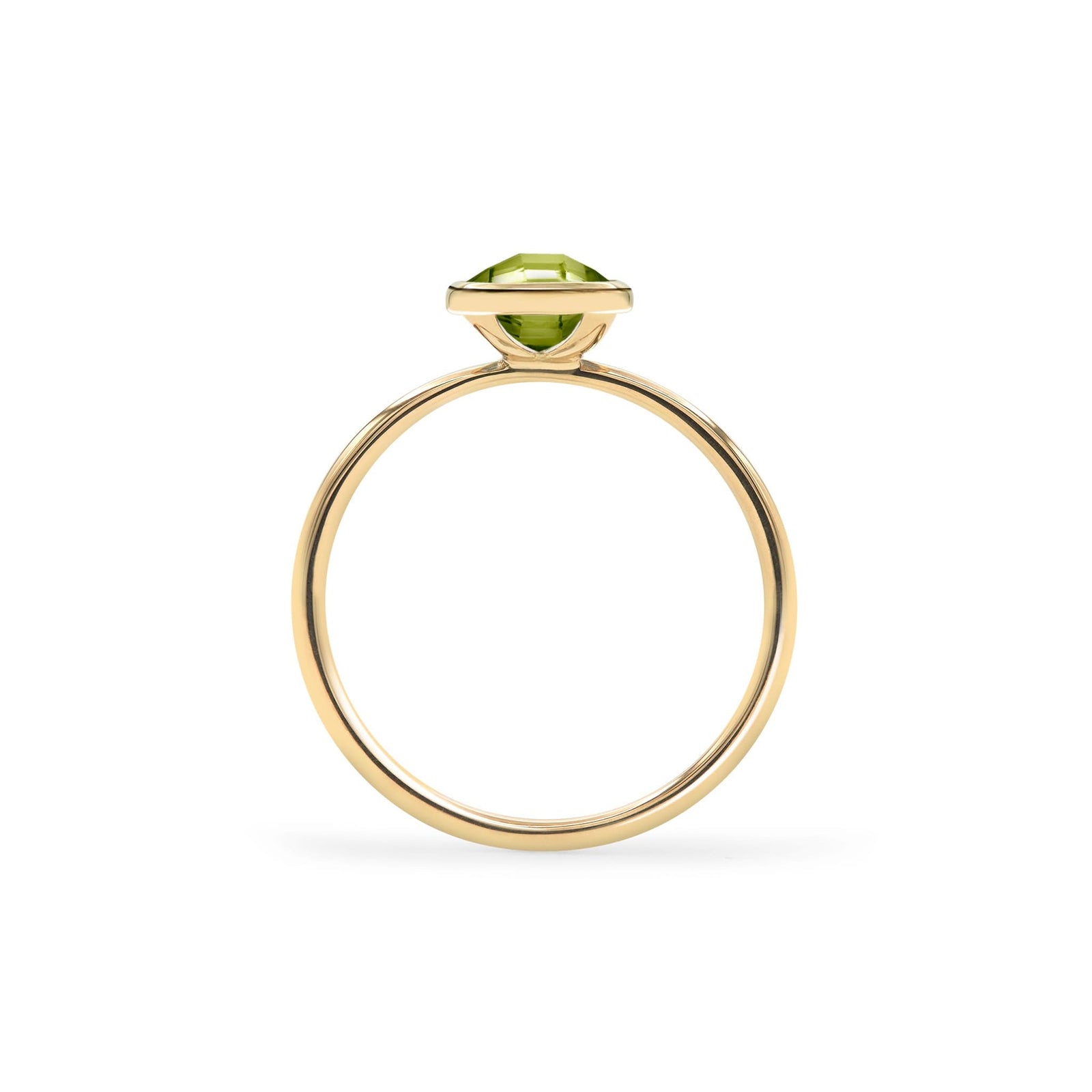 1.6 mm wide 14k yellow gold Grand ring featuring one 6 mm briolette cut bezel set peridot - standing view