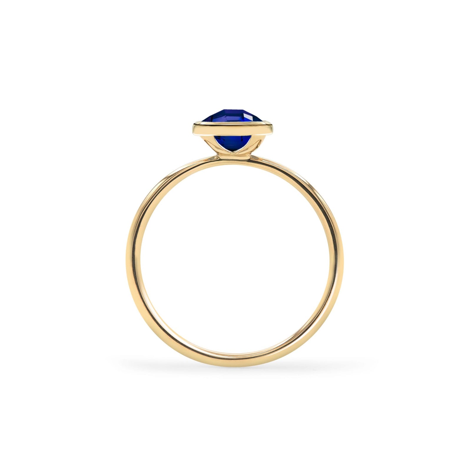 1.6 mm wide 14k yellow gold Grand ring featuring one 6 mm briolette cut bezel set sapphire - standing view