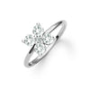 Greenwich ring featuring four 4 mm faceted round cut white topaz and one 2.1 mm diamond prong set in 14k white gold