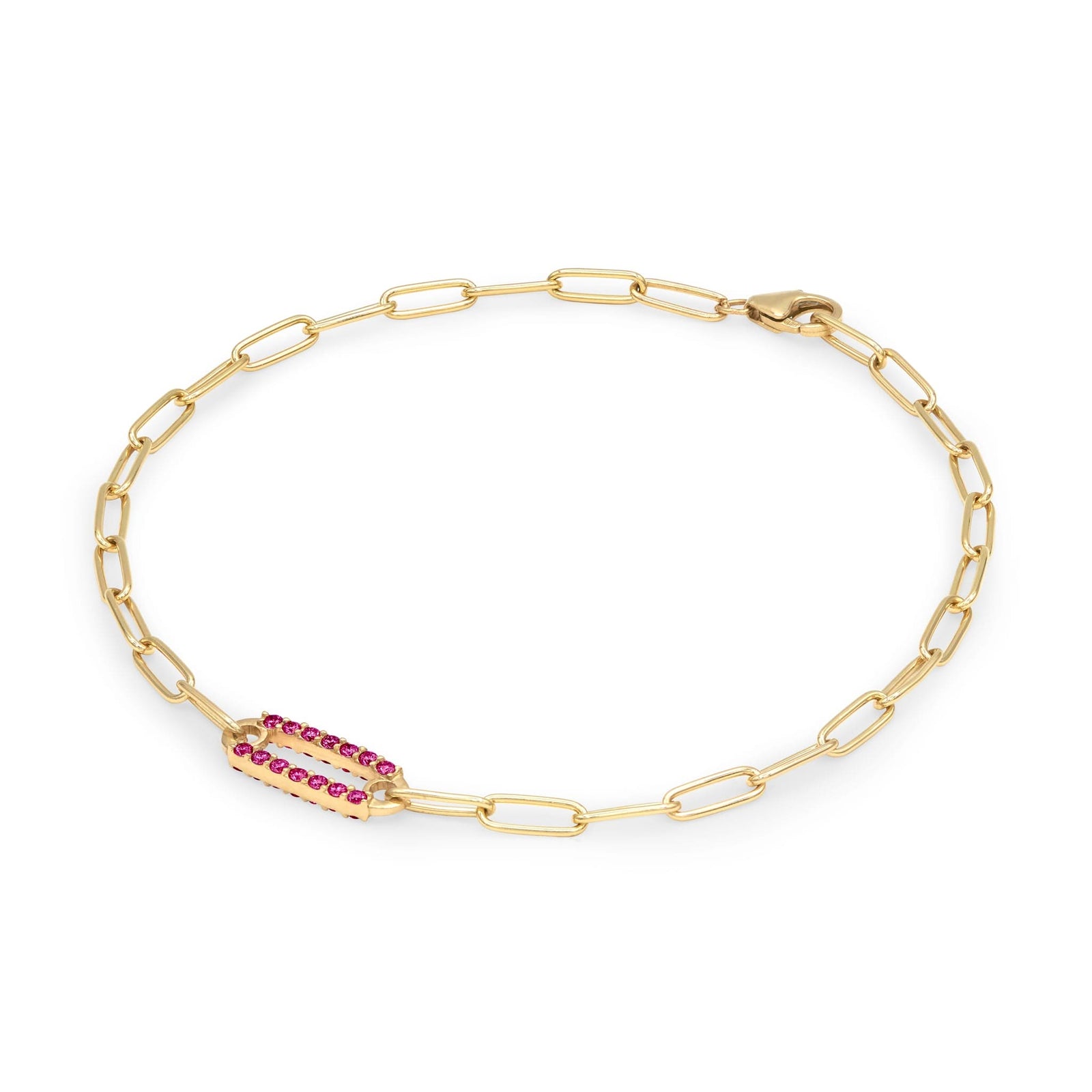 14k yellow gold Adelaide paperclip chain bracelet featuring one link encrusted with 1.5 mm pavé rubies - angled view