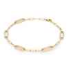 14k yellow gold Adelaide paperclip chain bracelet featuring five links encrusted with 1.5 mm pavé diamonds - angled view