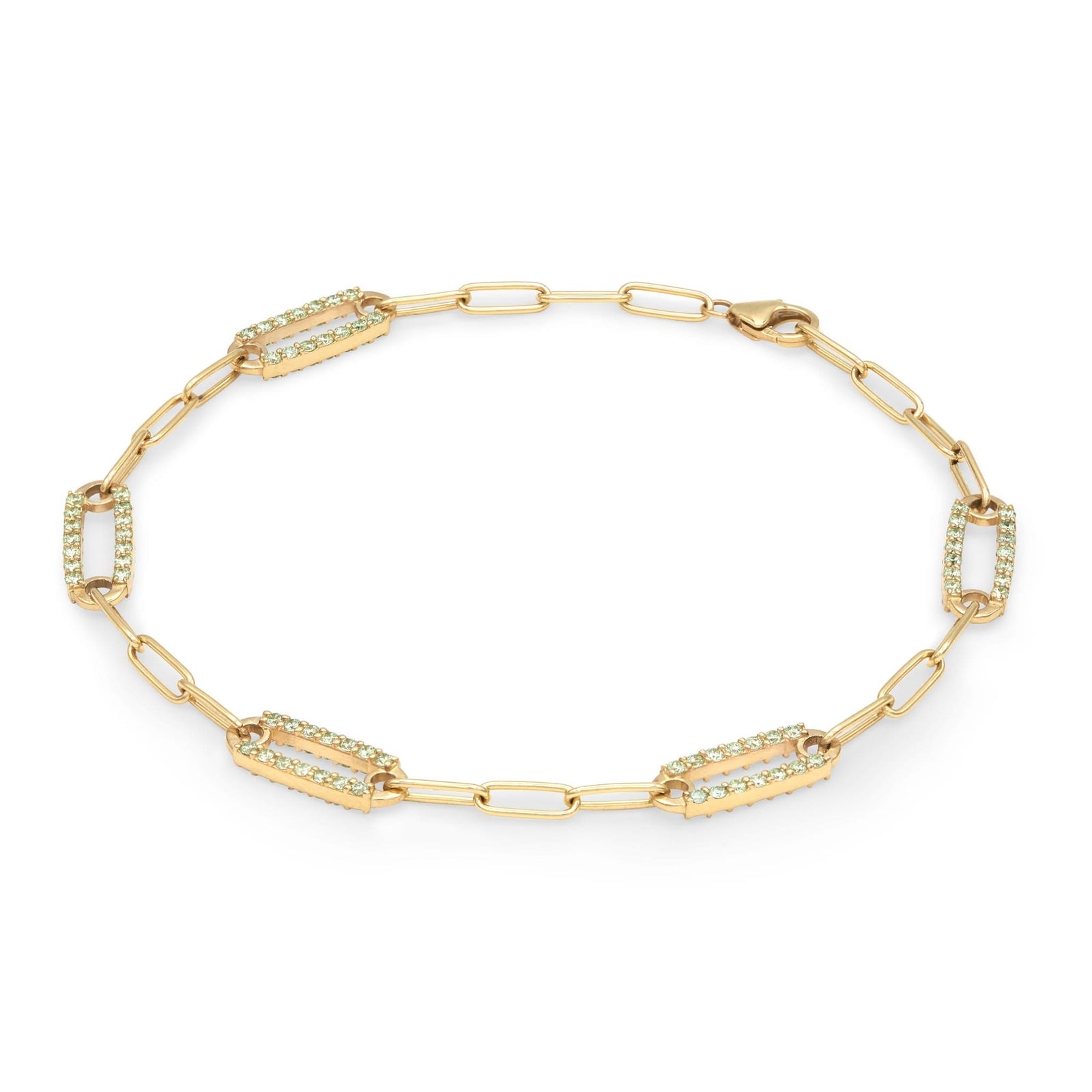 14k yellow gold Adelaide paperclip chain bracelet featuring five links encrusted with 1.5 mm pavé peridots - angled view