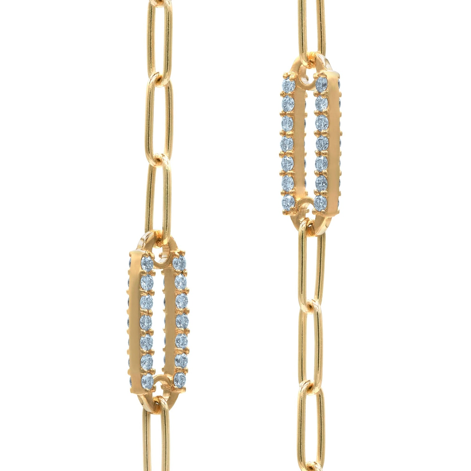 Pair of 14k yellow gold Adelaide paperclip chain pavé bracelets each featuring one Nantucket blue topaz-encrusted link