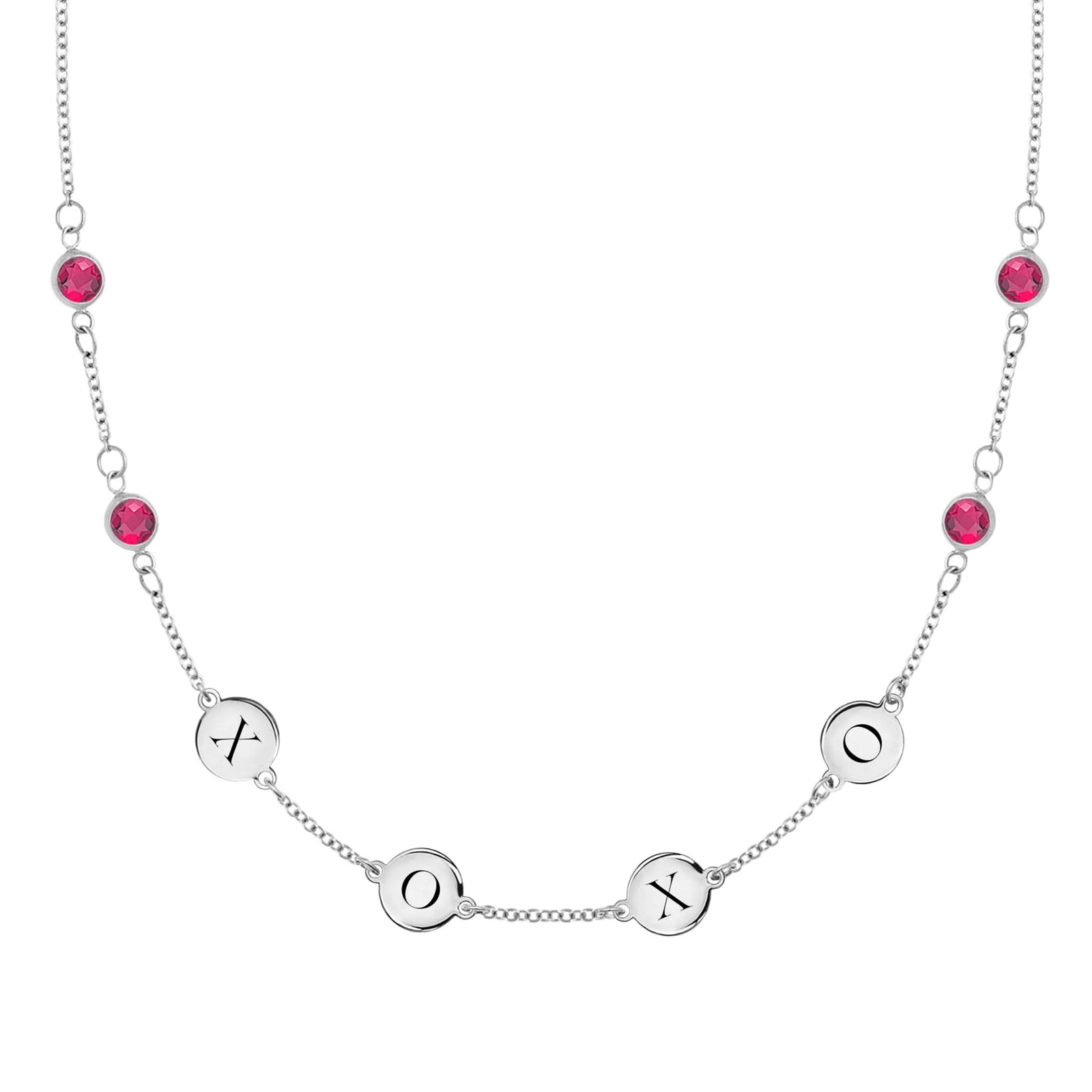 14k white gold cable chain necklace featuring four rubies and four 1/4” flat engraved letter discs, spelling XOXO