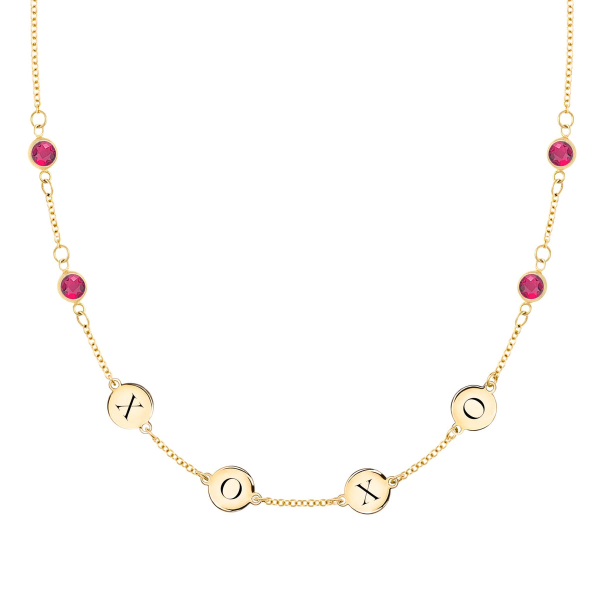 14k gold cable chain necklace featuring four rubies and four 1/4” flat engraved letter discs, spelling XOXO - front view