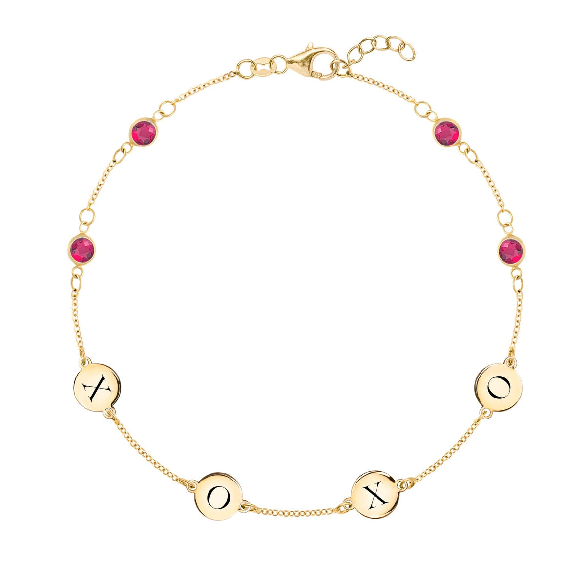 14k gold cable chain bracelet featuring four rubies and four 1/4” flat engraved letter discs, spelling XOXO - front view