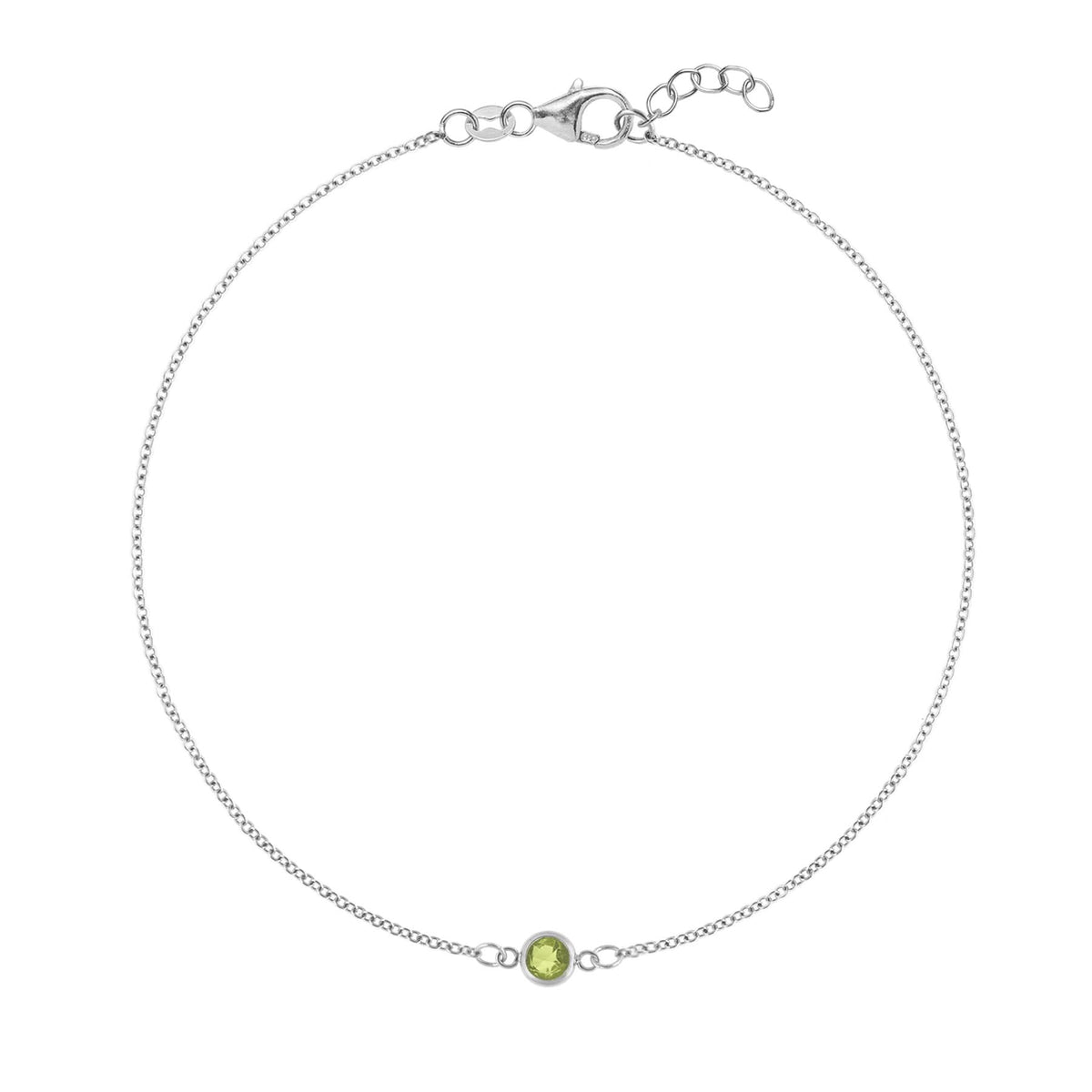 Classic cable chain bracelet featuring one 4 mm briolette cut peridot bezel set in 14k white gold