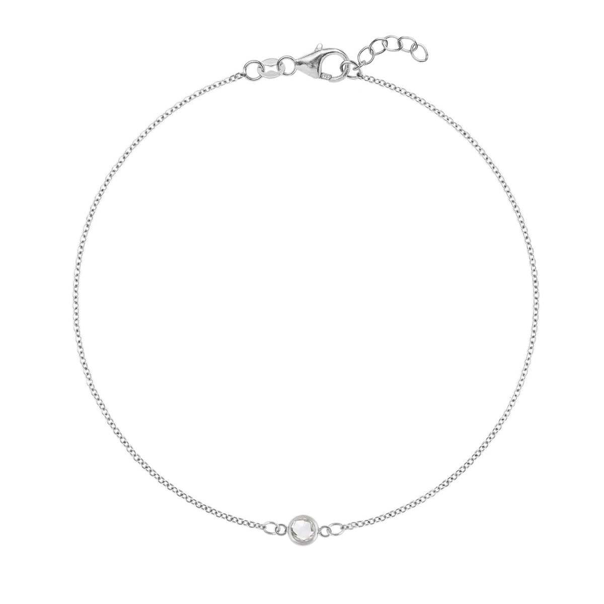 Classic cable chain bracelet featuring one 4 mm briolette cut white topaz bezel set in 14k white gold