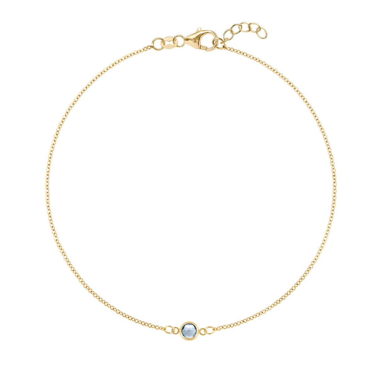 Classic cable chain bracelet featuring one 4 mm briolette cut aquamarine bezel set in 14k yellow gold - front view