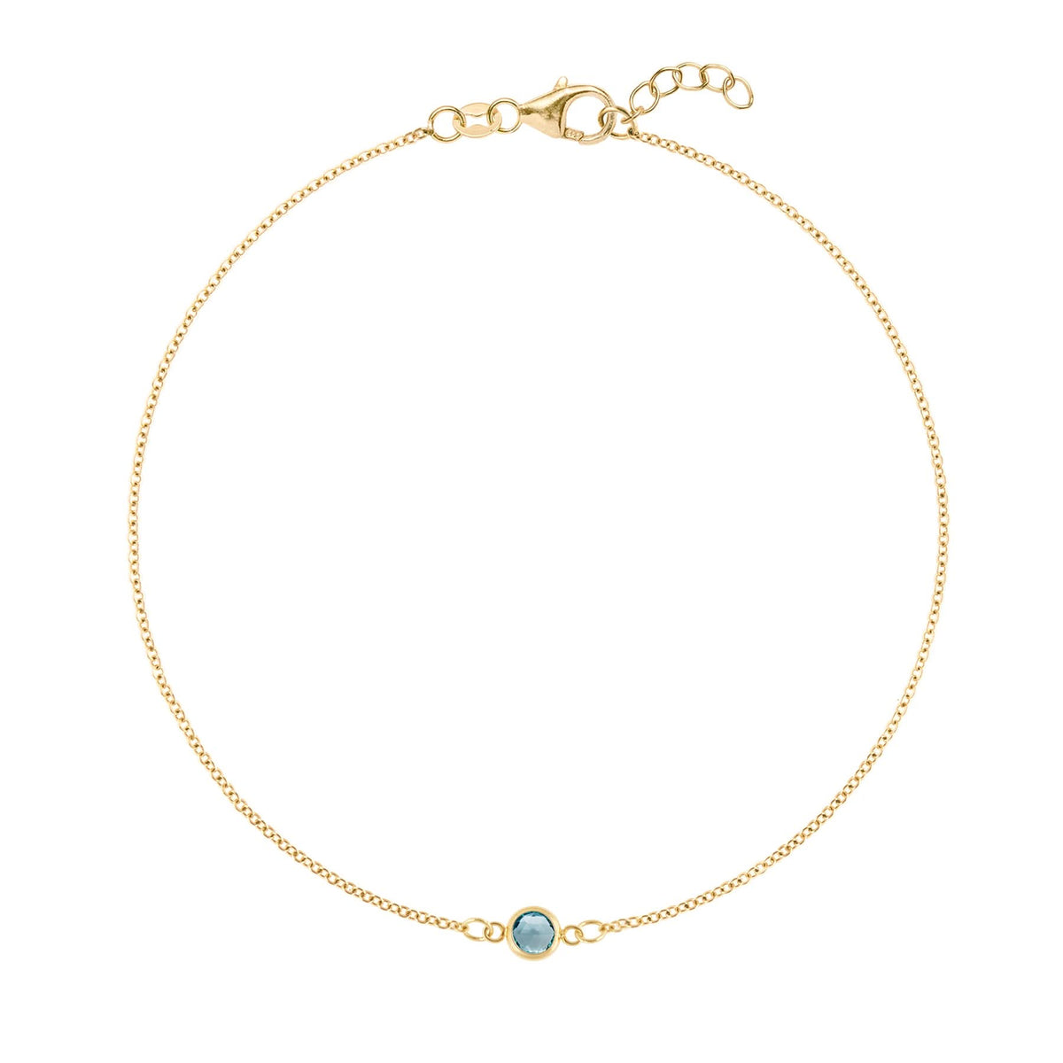 Classic cable chain bracelet featuring one 4 mm briolette cut Nantucket blue topaz bezel set in 14k yellow gold - front view