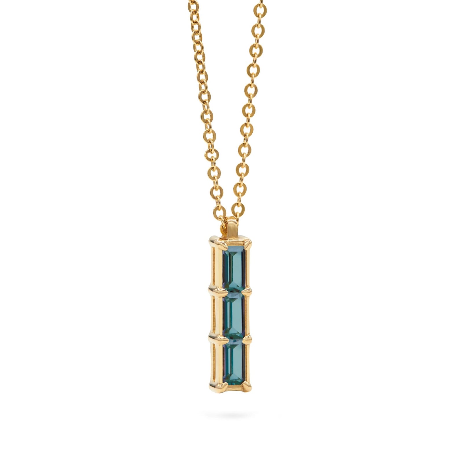 Providence Alexandrite vertical bar pendant featuring 3 petite baguette stones set in 14k yellow gold - angled view