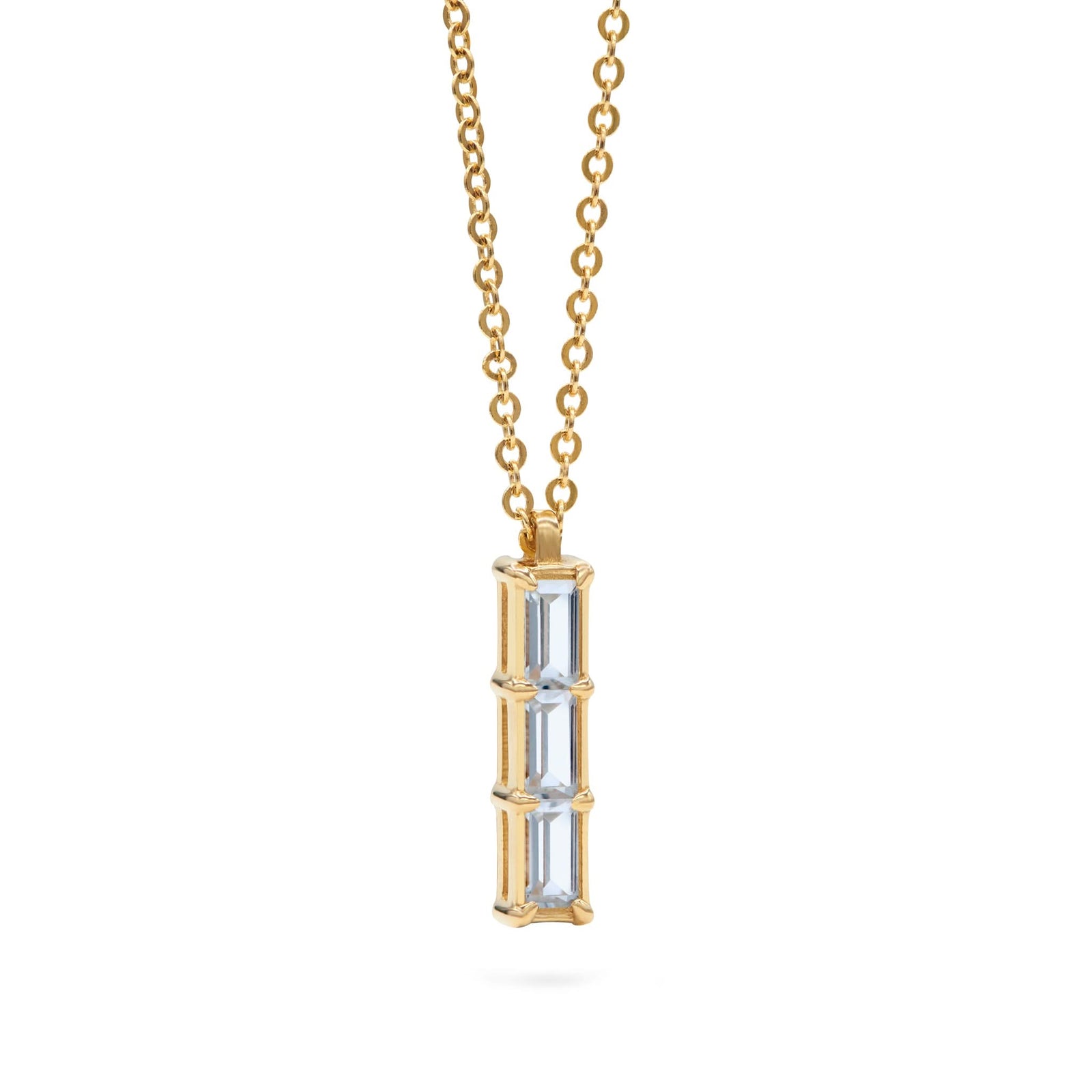 Providence Aquamarine vertical bar pendant featuring 3 petite baguette stones set in 14k yellow gold - angled view