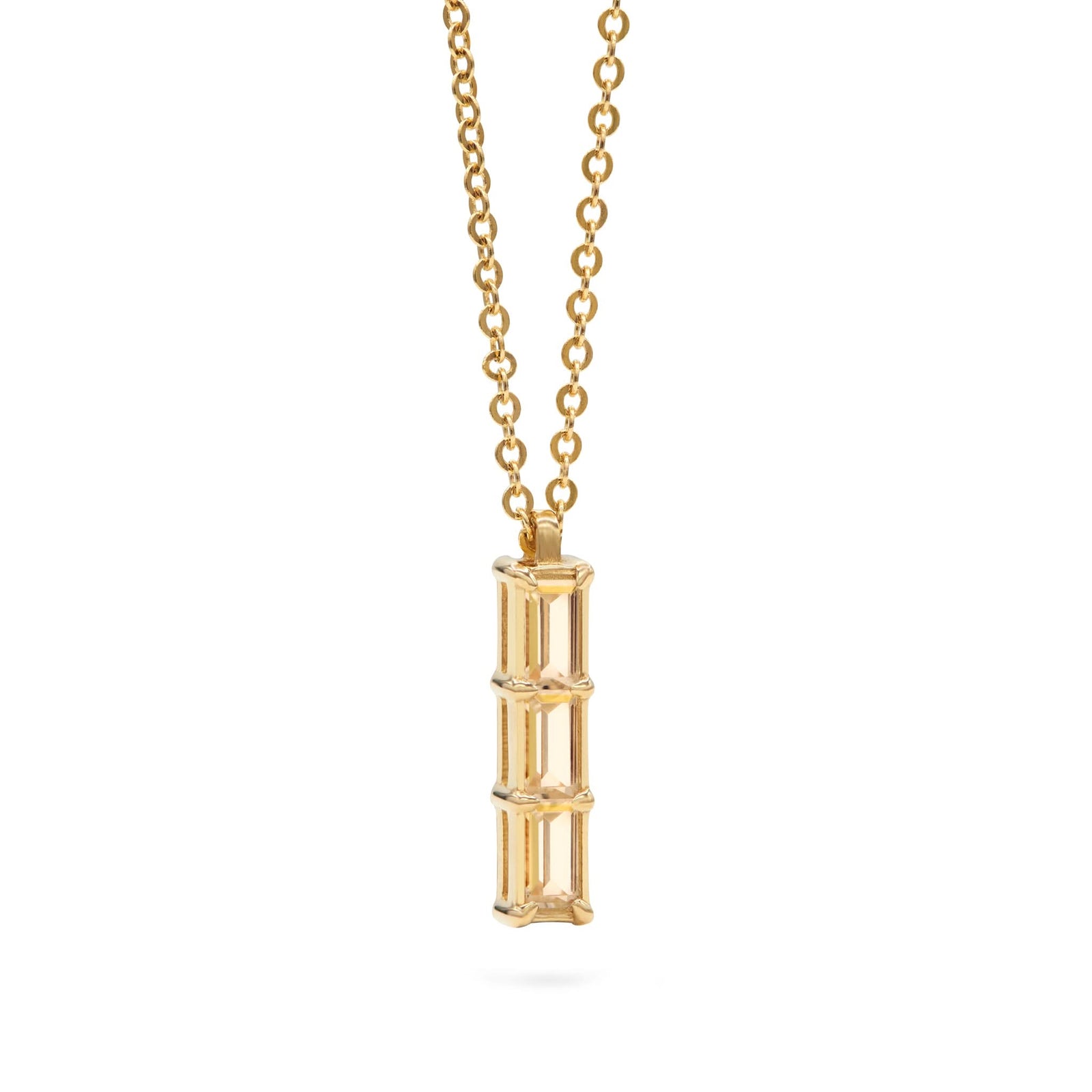 Providence Citrine vertical bar pendant featuring 3 petite baguette stones set in 14k yellow gold - angled view