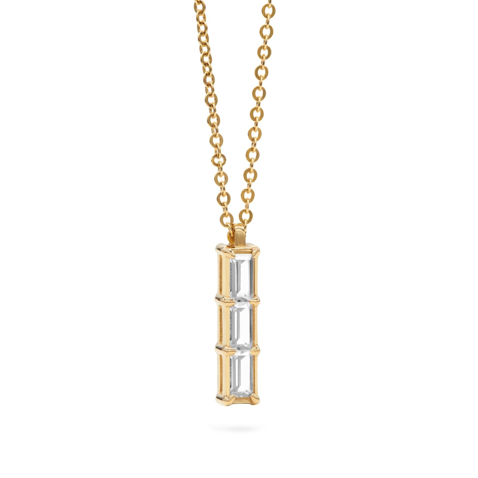 Providence White Topaz vertical bar pendant featuring 3 petite baguette stones set in 14k yellow gold - angled view