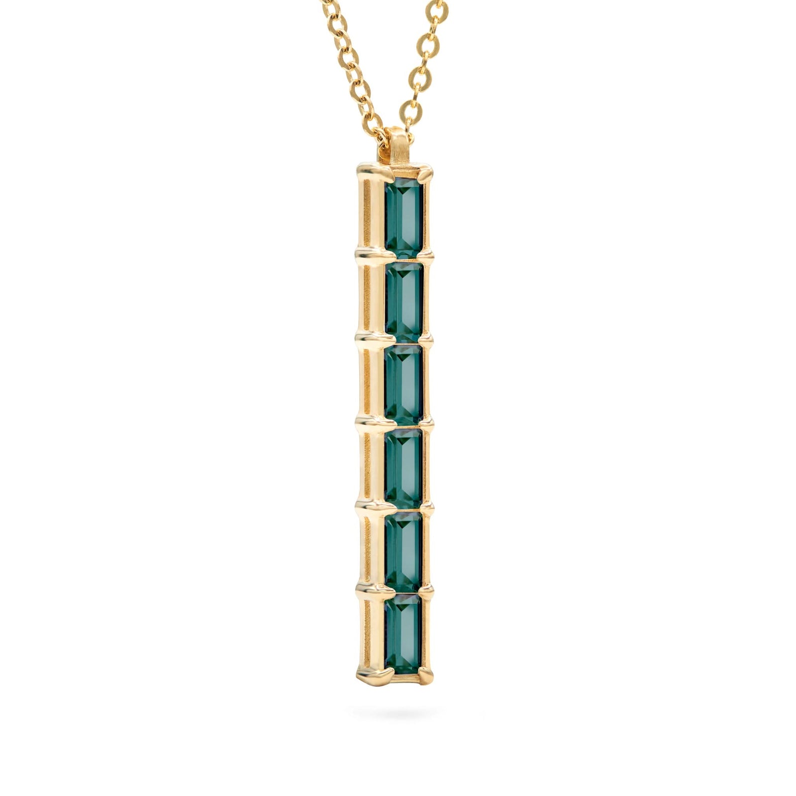 Providence vertical bar pendant featuring 6 petite Alexandrite baguette stones set in 14k yellow gold - angled view