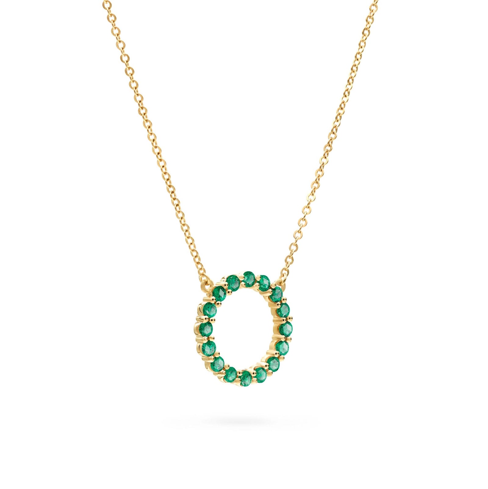Rosecliff open circle necklace with sixteen 2 mm faceted round cut emeralds prong set in 14k yellow gold - angled view
