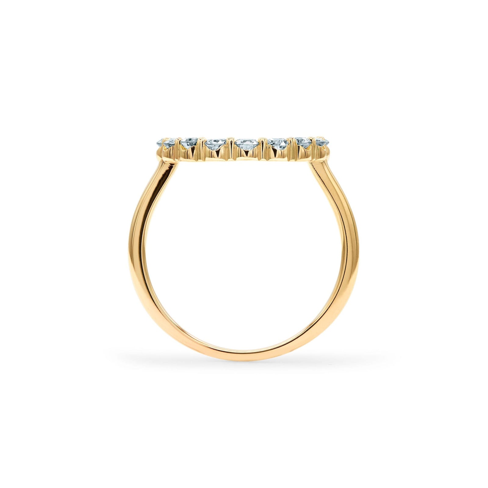 Rosecliff open circle ring featuring sixteen 2 mm faceted round cut aquamarines prong set in 14k yellow gold - standing view