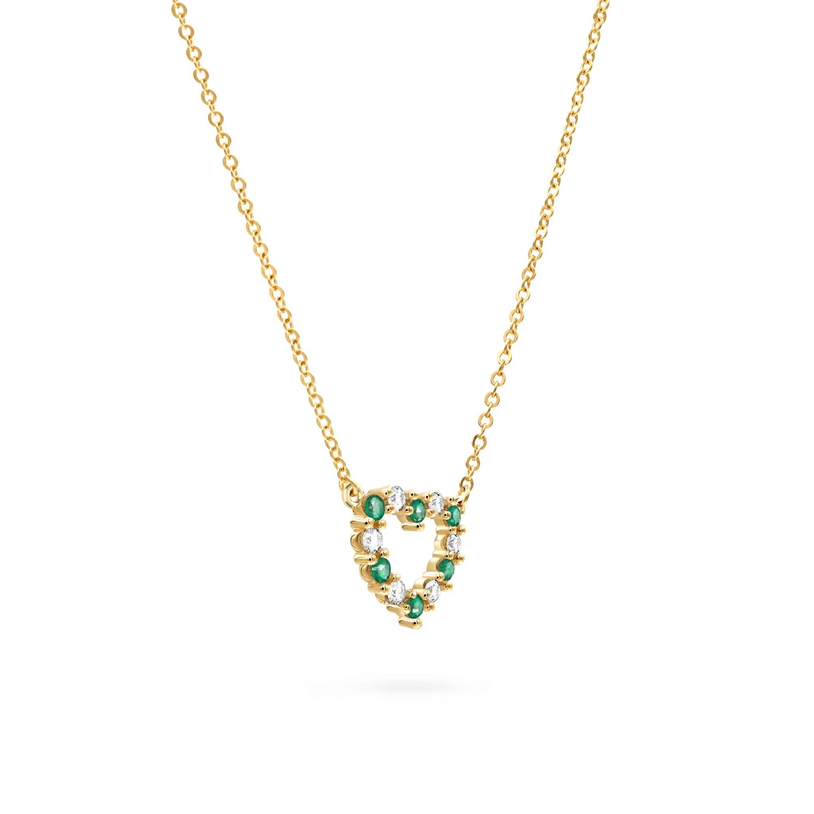 Rosecliff Heart Necklace featuring twelve alternating emeralds and diamonds prong set in 14k yellow Gold - angled view