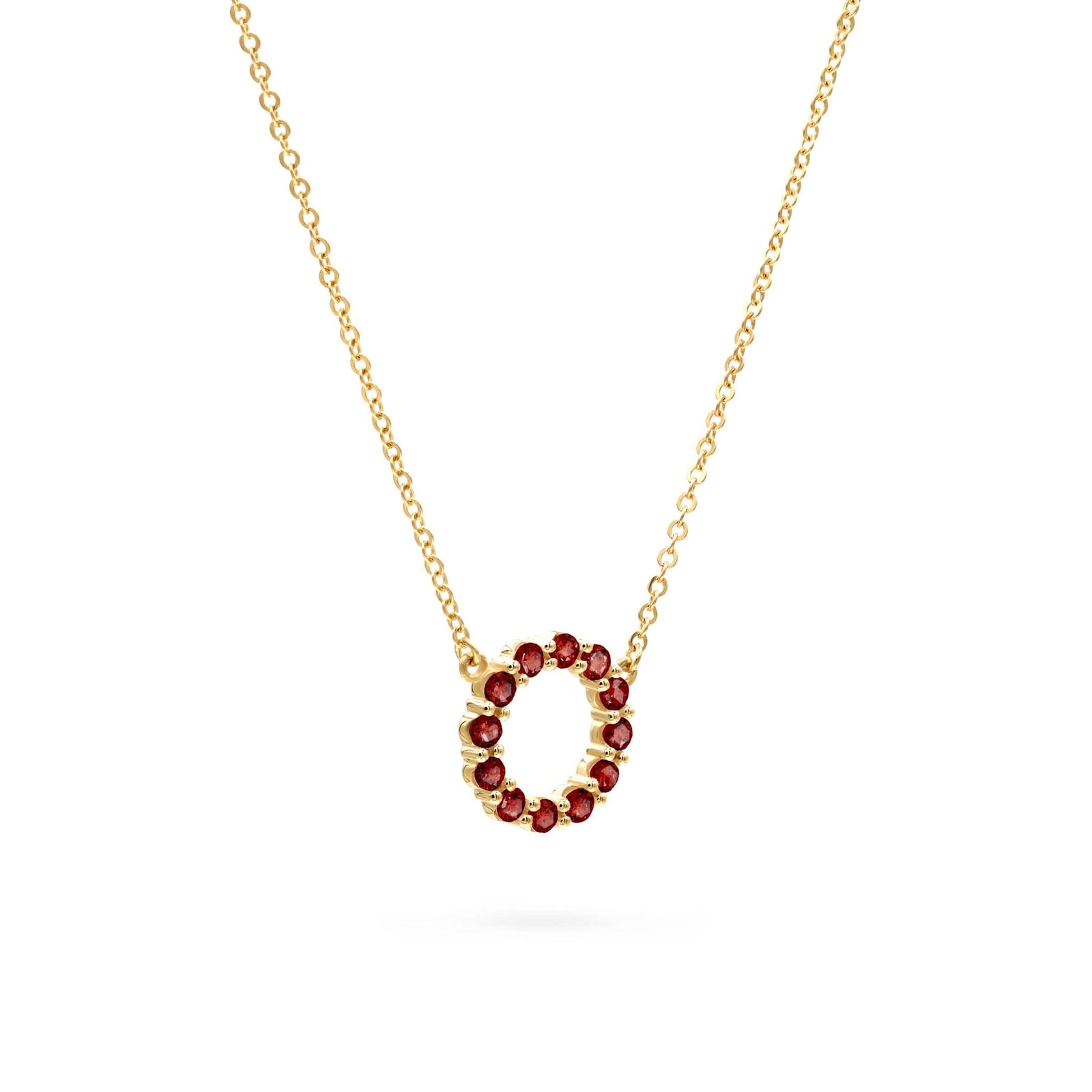 Rosecliff small circle necklace featuring twelve 2mm faceted round cut garnets prong set in 14k yellow gold - angled view