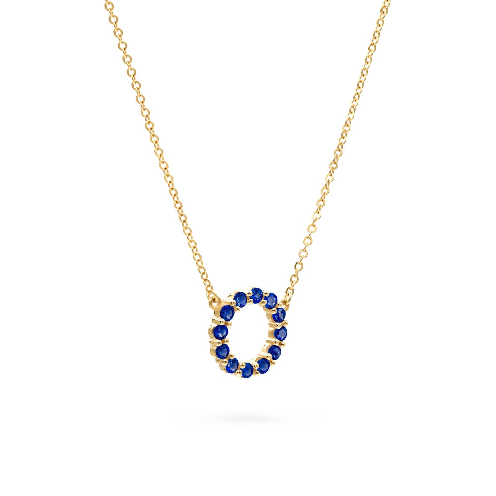 Rosecliff small open circle necklace featuring twelve 2 mm faceted round cut sapphires prong set in 14k gold - angled view