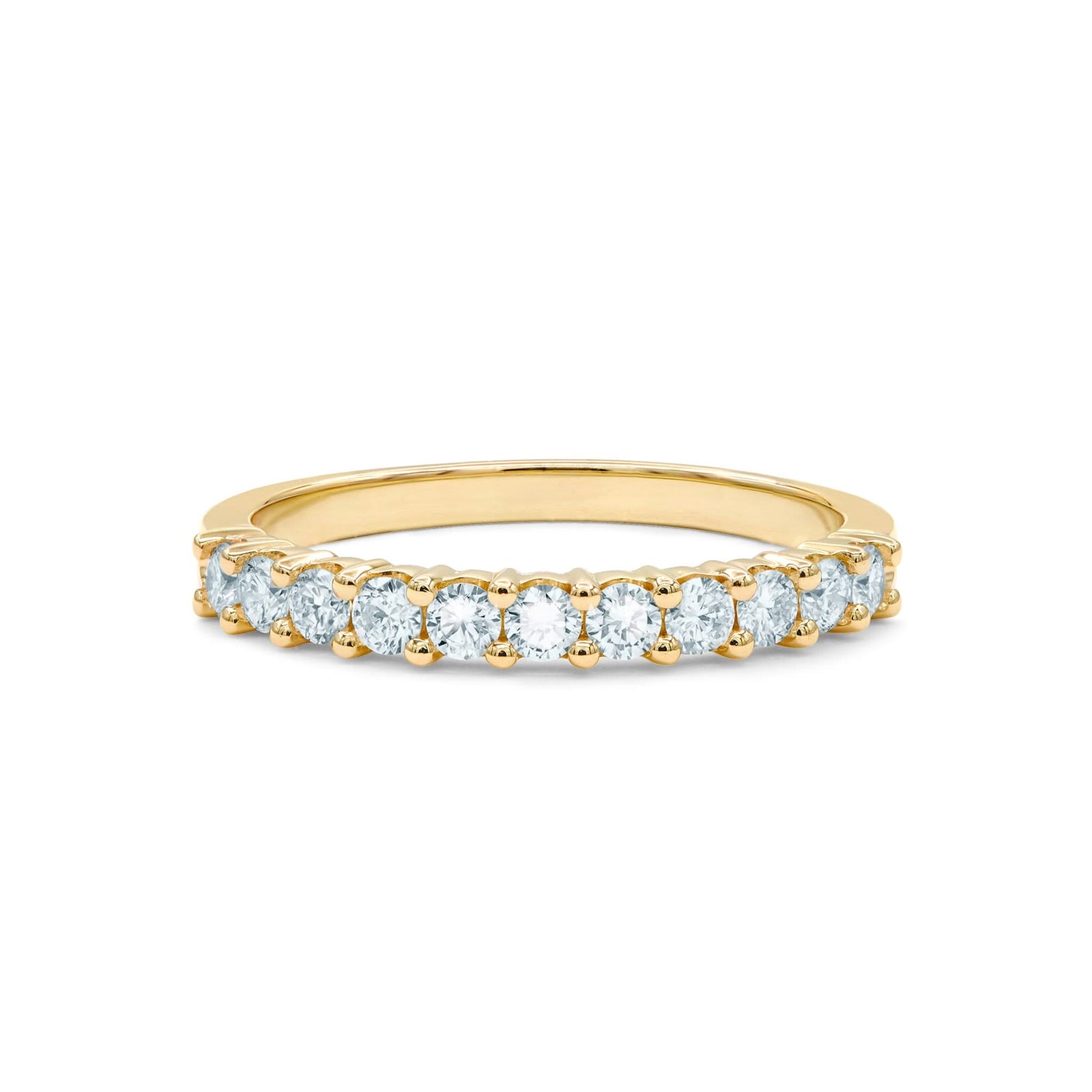 Rosecliff stackable ring featuring eleven 2 mm faceted round cut aquamarines prong set in 14k yellow gold