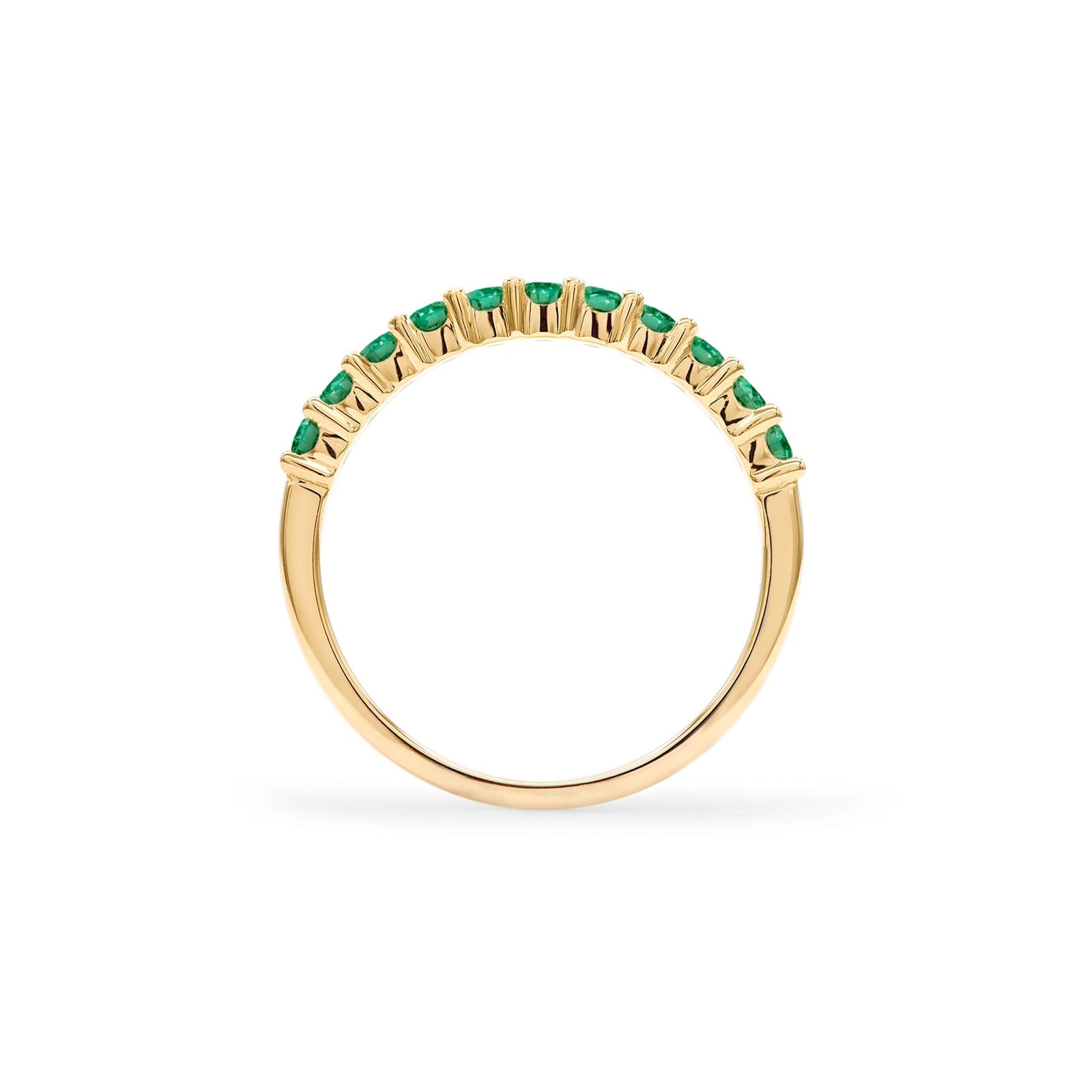 Rosecliff stackable ring featuring eleven 2 mm faceted round cut emeralds prong set in 14k yellow gold - standing view