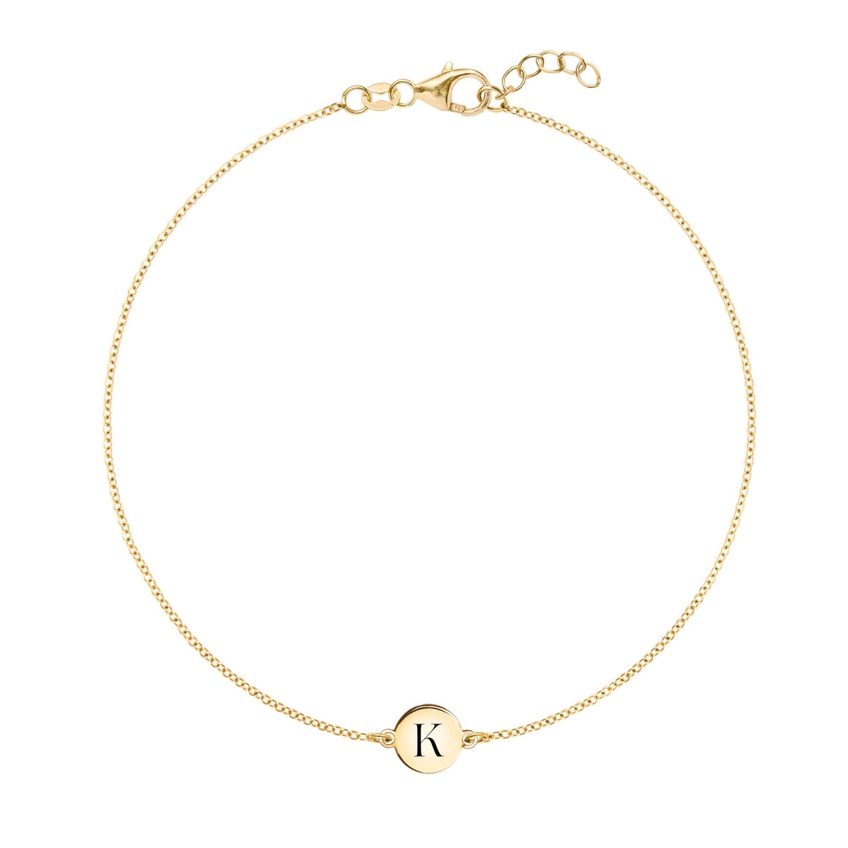 14k yellow gold cable chain bracelet featuring one 1/4” flat disc engraved with the letter K - front view