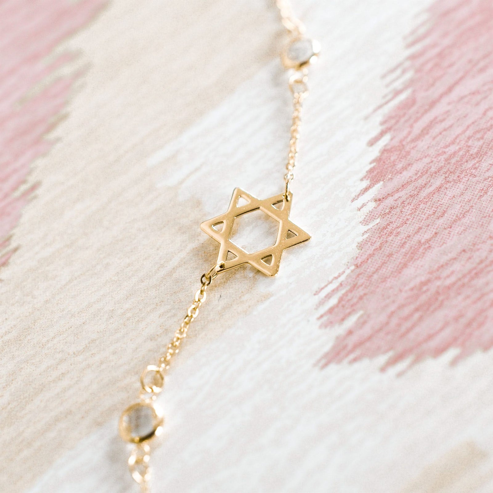 14k yellow gold Classic cable chain bracelet featuring birthstones and a 1/2" cutout Star of David