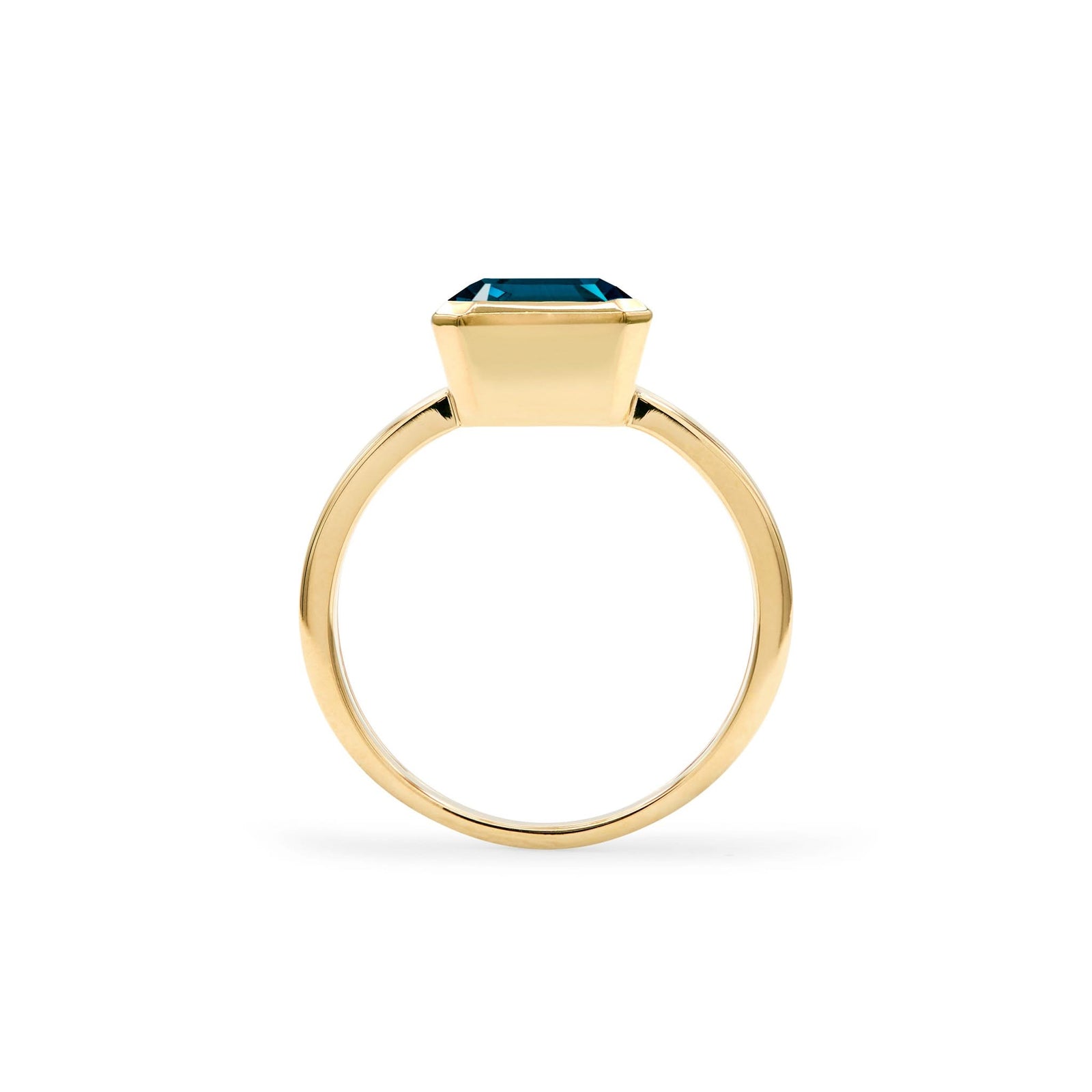 Warren Vertical Atlantic Blue Topaz Ring, featuring an Atlantic Blue Topaz-cut 8 x 10mm Atlantic Blue Topaz in 14k gold, hand-set Vertically in a 14k-gold bezel - standing view.