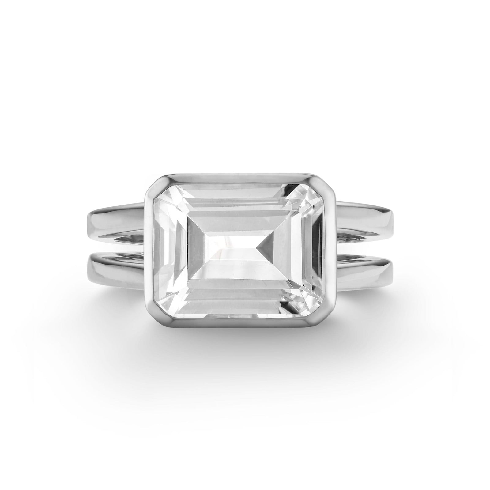 Warren Horizontal White Topaz Ring, featuring an emerald-cut 8 x 10mm White Topaz in 14k gold, hand-set horizontally in a 14k white gold bezel - front view.