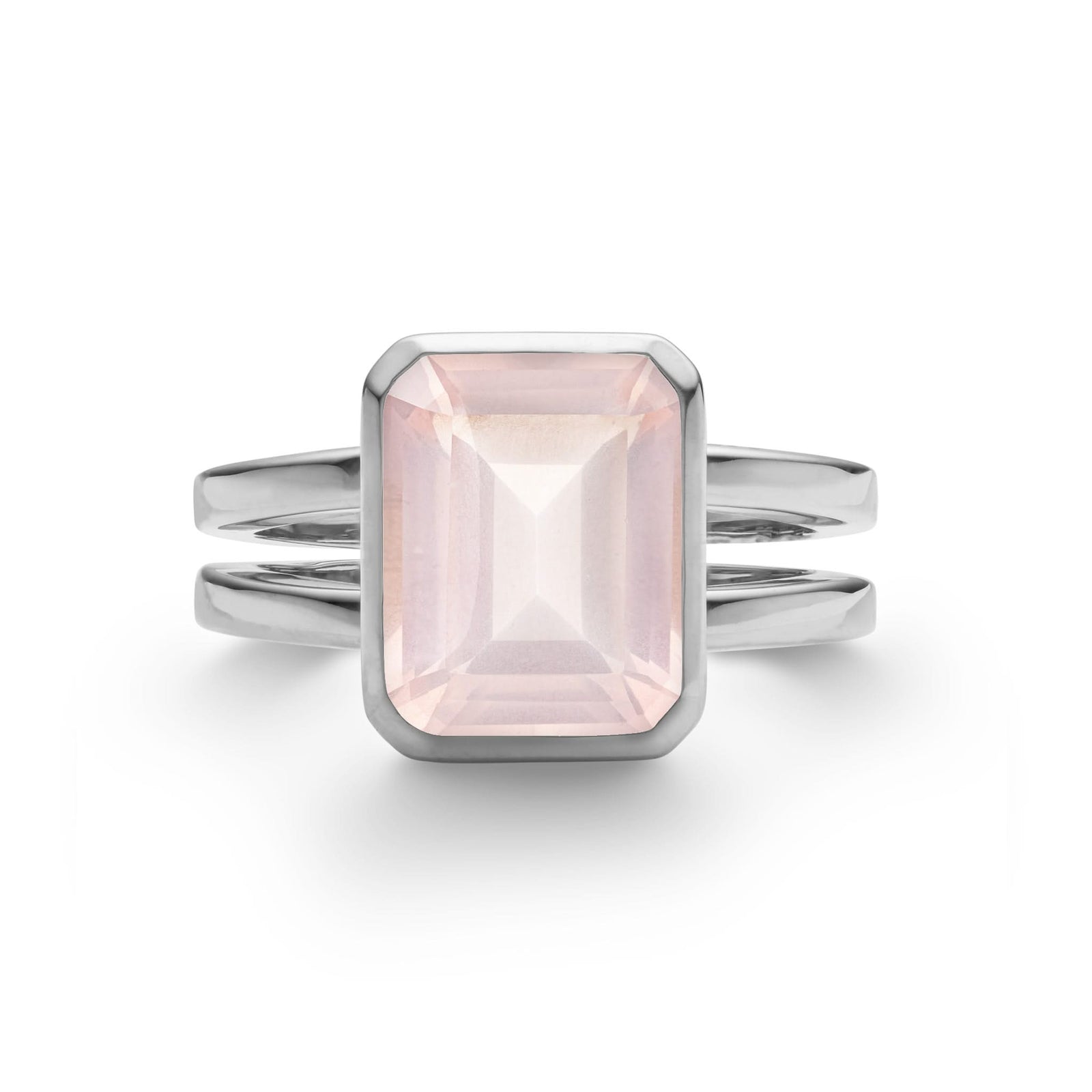 Warren ring in 14k white gold featuring one 10 x 8 mm emerald cut bezel set rose quartz - front view