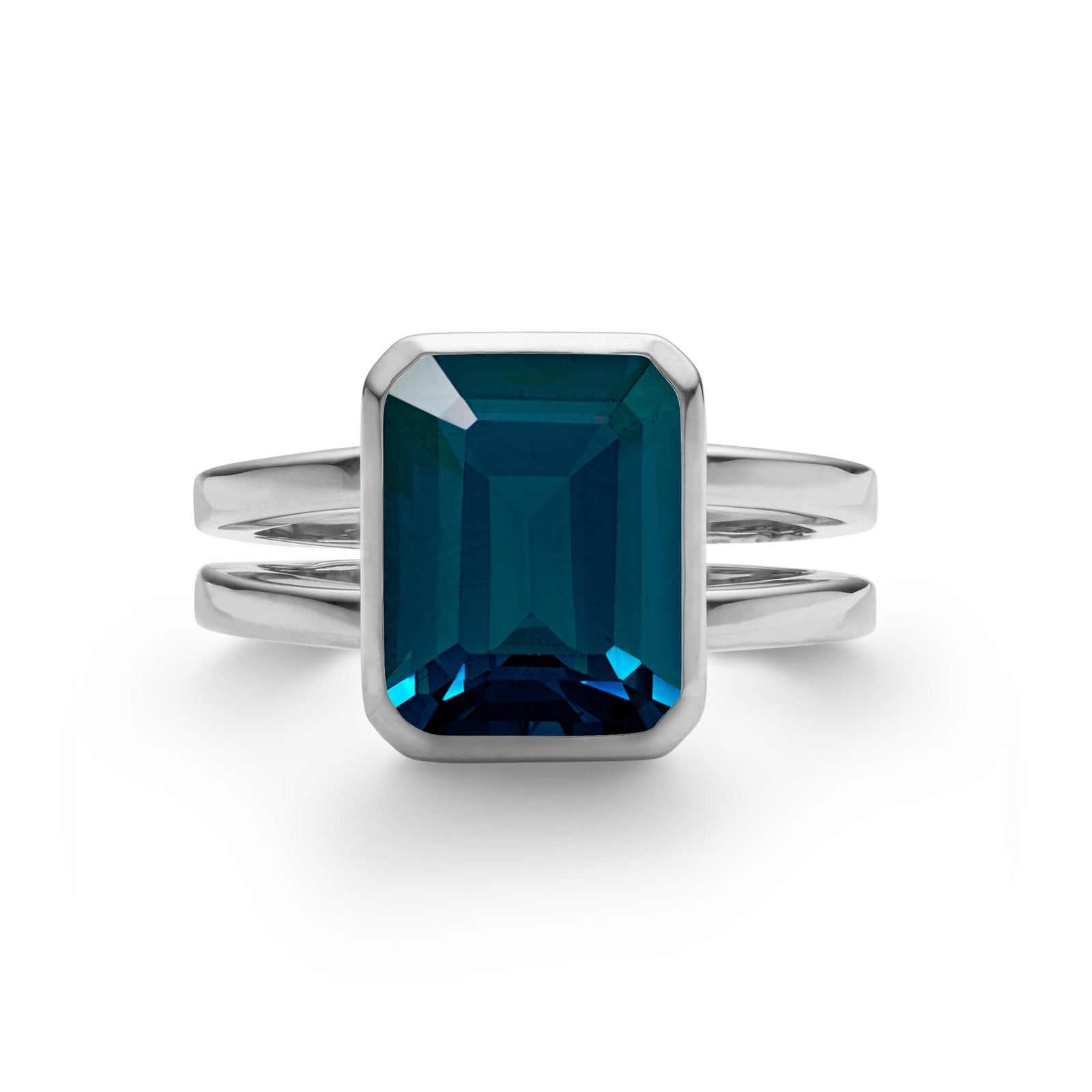 Warren Vertical Atlantic Blue Topaz Ring, featuring one 10 x 8 mm emerald cut, bezel set Atlantic Blue Topaz in 14k White Gold - front view.