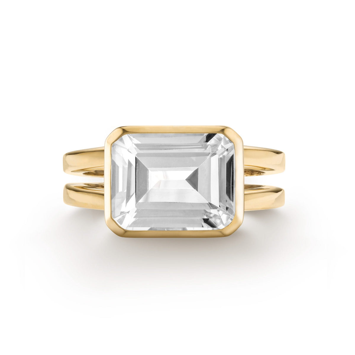 Warren Horizontal White Topaz Ring, featuring an emerald-cut 8 x 10mm White Topaz in 14k gold, hand-set horizontally in a 14k-gold bezel - front view.