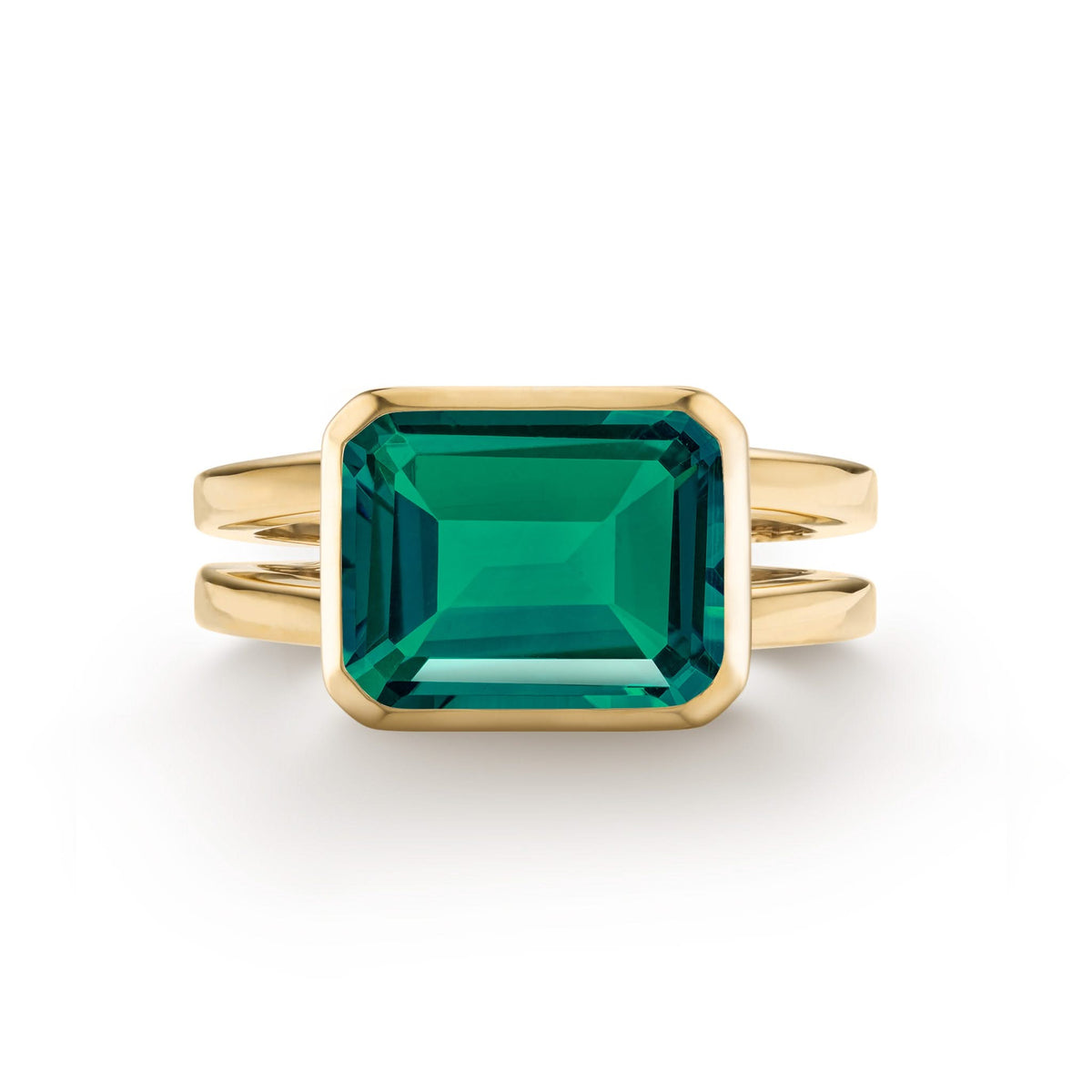 Warren Horizontal Emerald Ring, featuring an emerald-cut 8 x 10mm Emerald in 14k gold, hand-set horizontally in a 14k-gold bezel - front view.