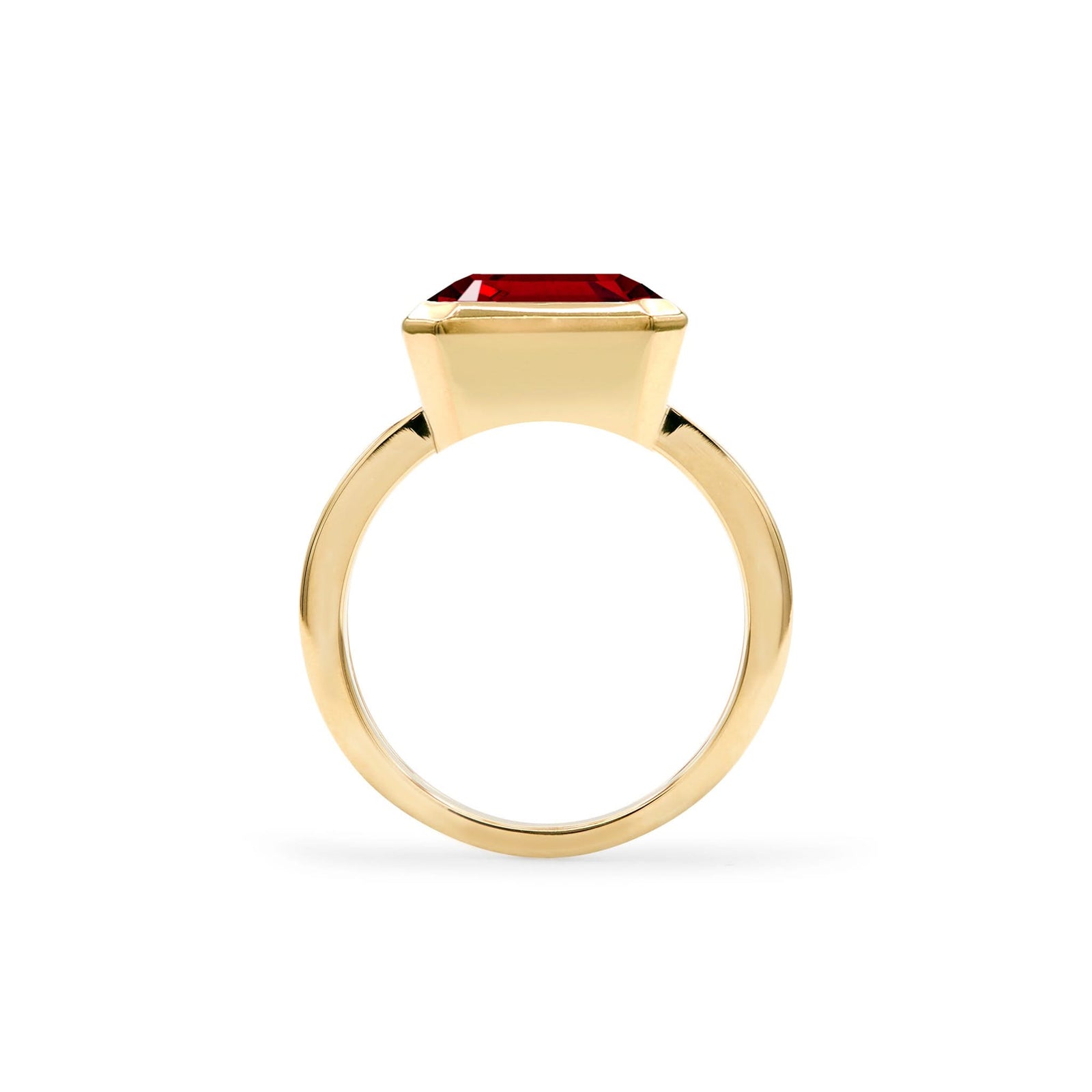 Warren Horizontal Garnet Ring, featuring an emerald-cut 8 x 10mm Garnet in 14k gold, hand-set horizontally in a 14k-gold bezel - standing view.