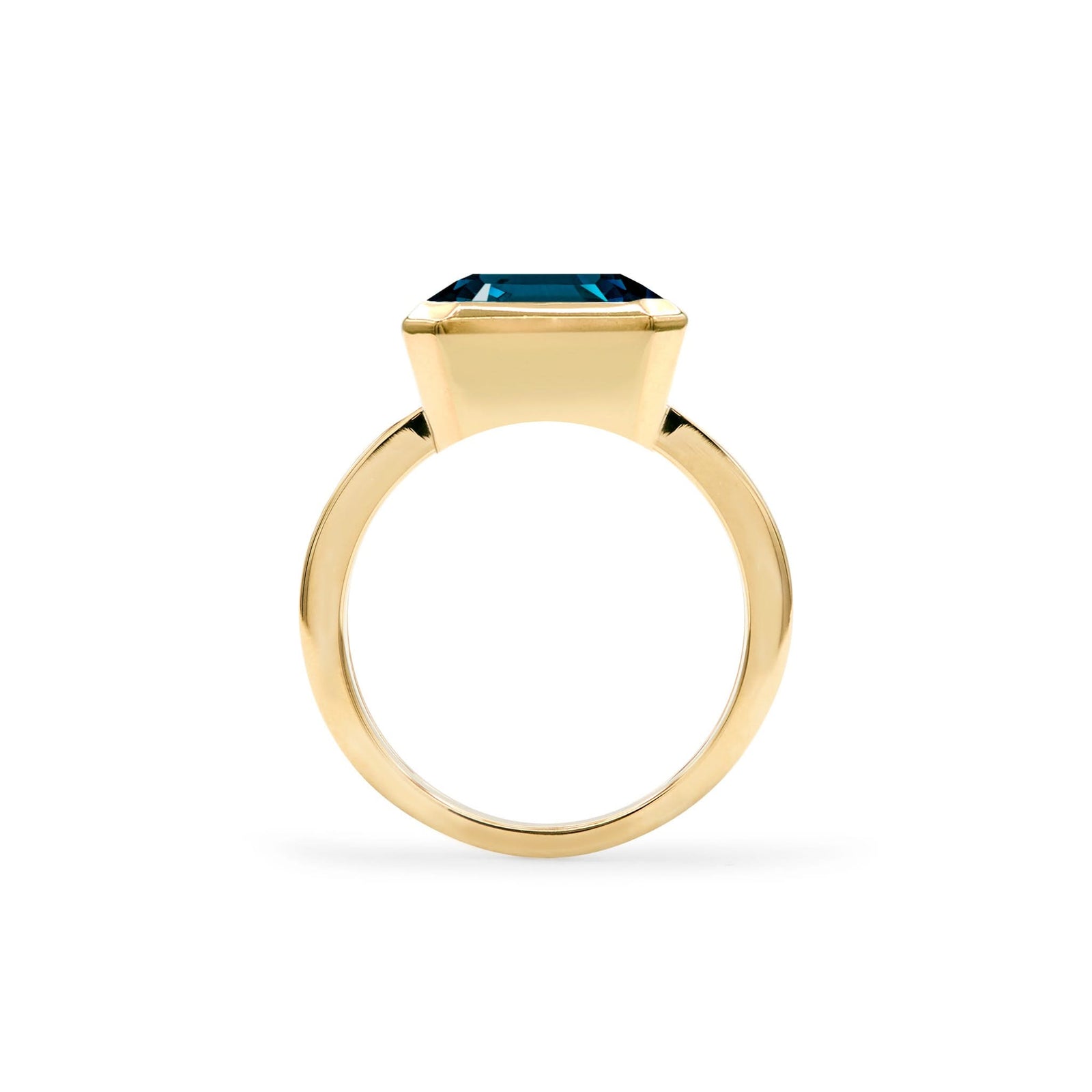 Warren Horizontal Atlantic Blue Topaz Ring, featuring an Atlantic Blue Topaz-cut 8 x 10mm Atlantic Blue Topaz in 14k gold, hand-set horizontally in a 14k-gold bezel - standing view.