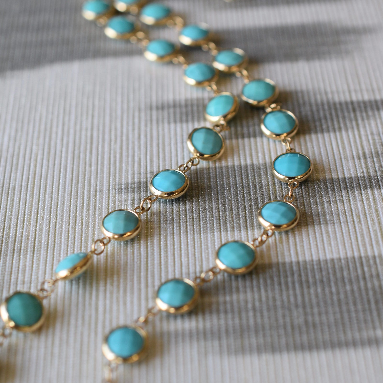 Newport Grand 14k yellow gold necklace featuring 6 mm briolette cut bezel set turquoises