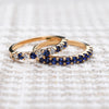 Two HAVERHILL Rosecliff Stackable rings in 14k yellow gold. Top ring has 2 mm sapphires and diamonds, bottom ring has 11 two mm sapphires.