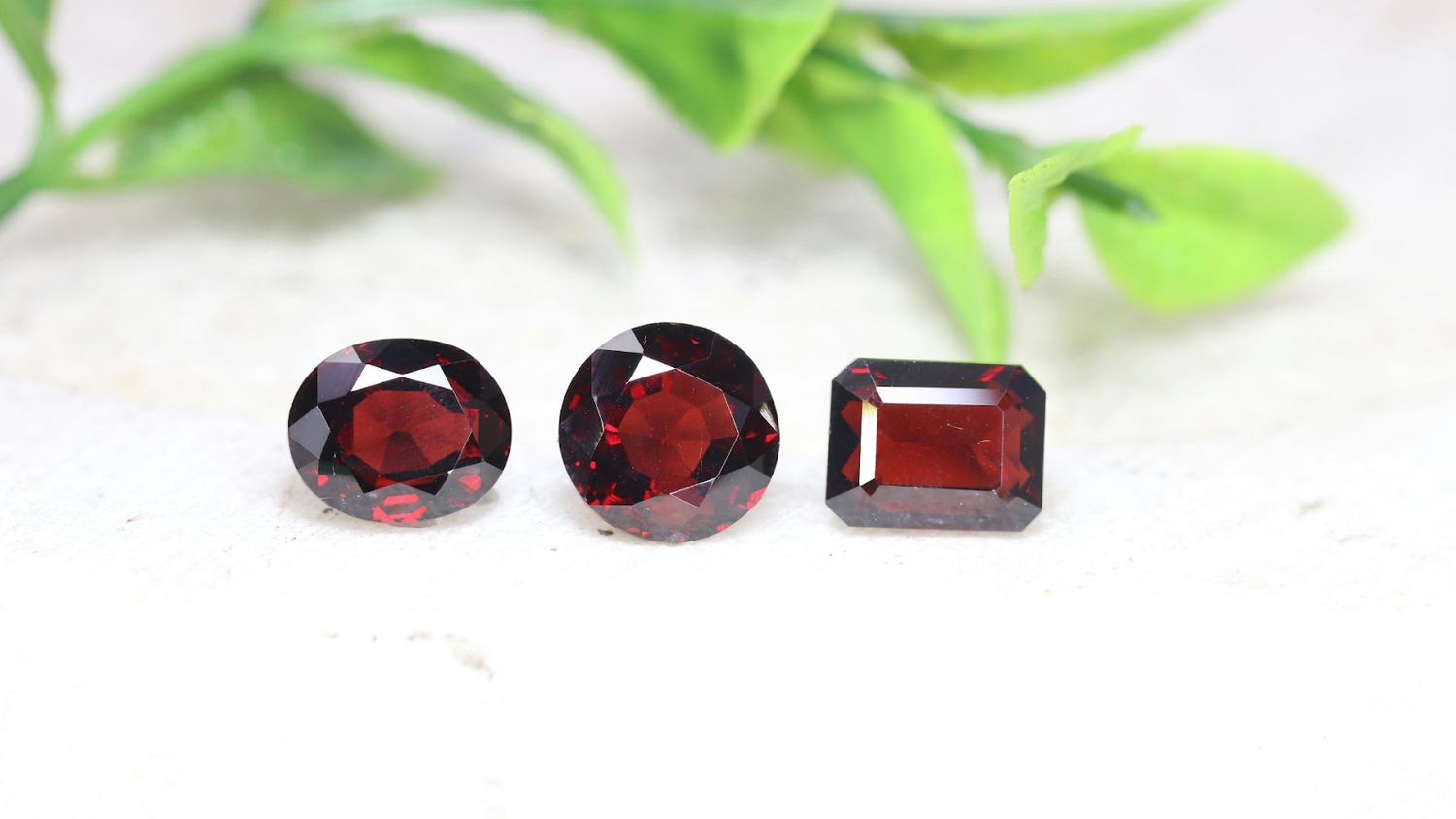 Three Different Garnet Gemstones In A Natural Ruby Red