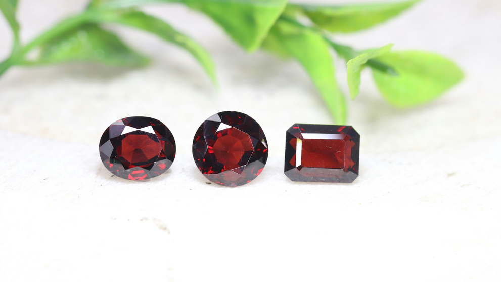 Three Different Garnet Gemstones In A Natural Ruby Red