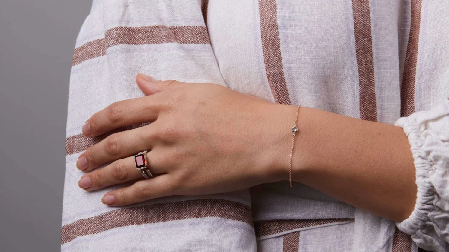 Woman Wearing a Red Warren Garnet Ring