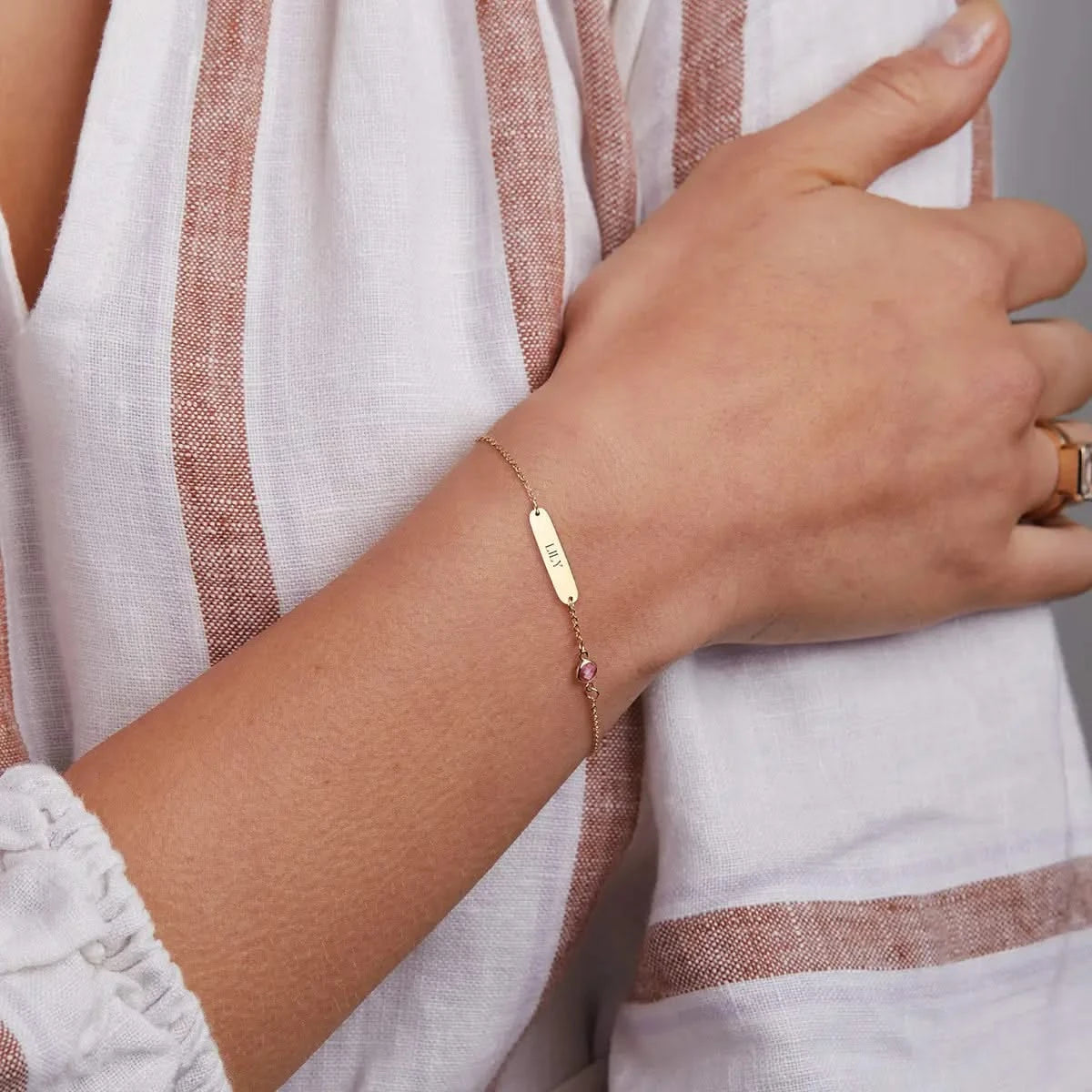 1 Nameplate & 1 Petite Pink Sapphire Bracelet in 14k Gold (October)