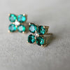 Pair of Greenwich 4 Birthstone in 14k Gold featuring four 4 mm faceted round cut, prong set Emeralds and one 2.1 mm Diamond. 