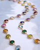 Newport Grand necklace featuring 6mm rainbow patterned, briolette cut, bezel set gemstones in 14k yellow gold.