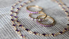 Three Rosecliff Amethyst Stackable rings, one with alternating diamonds, and Newport Amethyst Necklace in 14k yellow gold.
