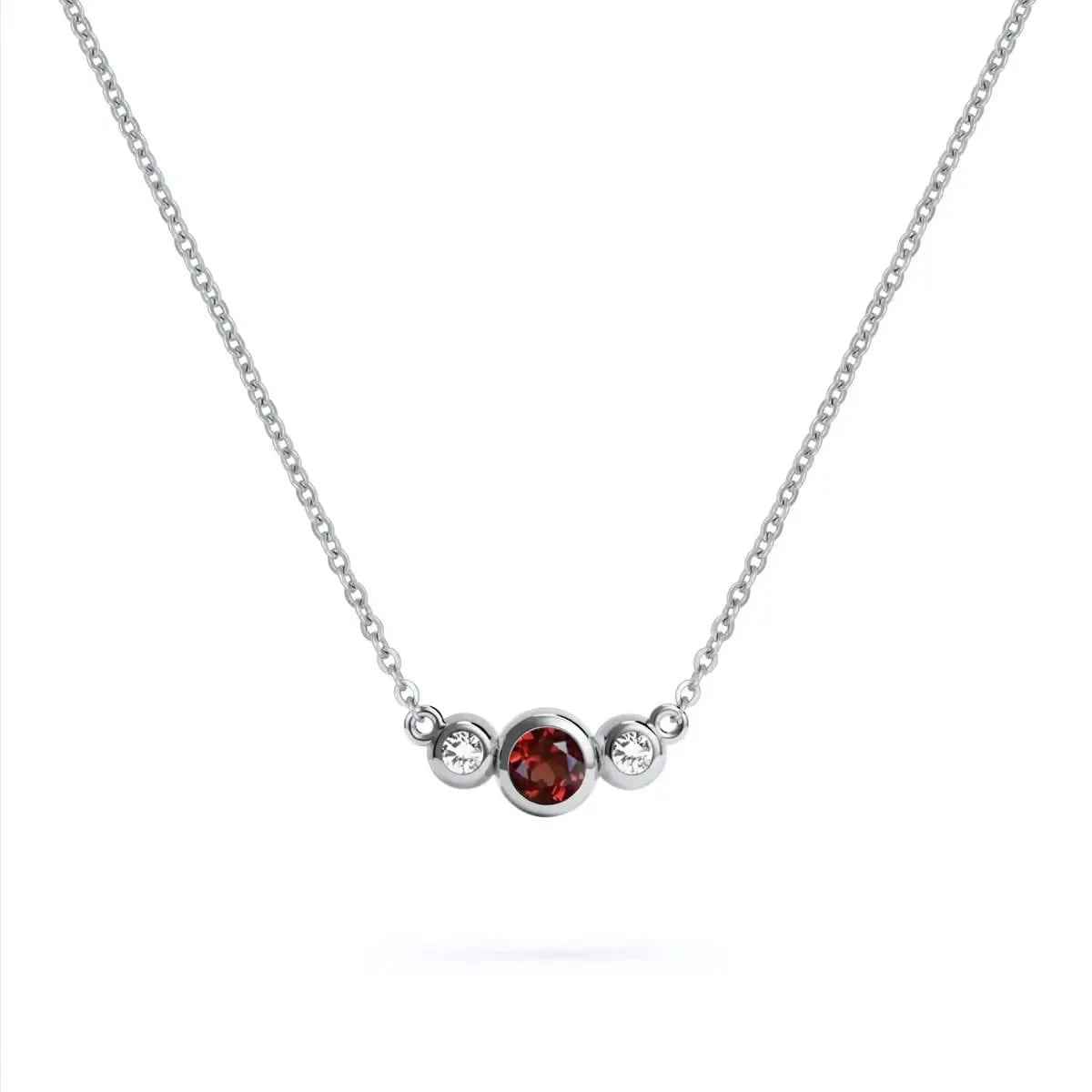 Barrington 3 Stone Necklace featuring a 4 mm round cut Garnet center stone framed by two 2 mm round cut Diamonds bezel set in 14k white gold on a saffron chain – front view