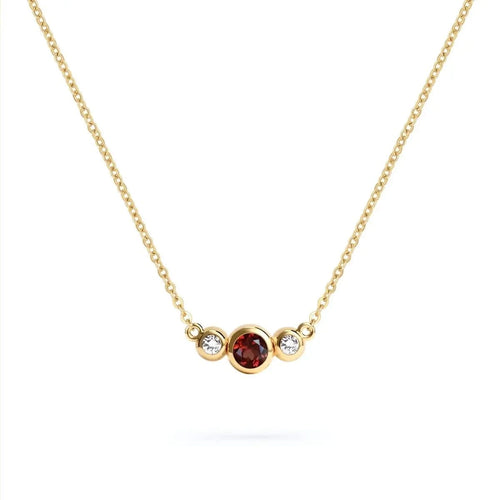 Barrington 3 Stone Necklace featuring a 4 mm round cut Garnet center stone framed by two 2 mm round cut Diamonds bezel set in 14k yellow gold on a saffron chain – front view