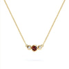 Barrington 3 Stone Necklace featuring a 4 mm round cut Garnet center stone framed by two 2 mm round cut Diamonds bezel set in 14k yellow gold on a saffron chain – front view